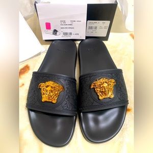 Brand new Versace slides in black with gold Medusa head size 41